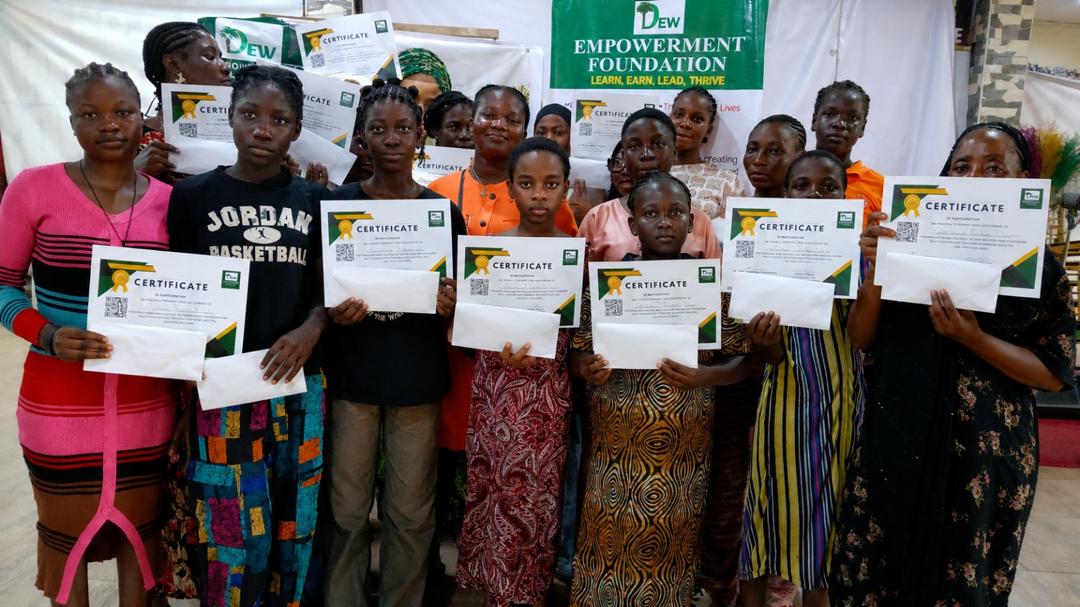 The first Mom and Daughter Enterprise Hub cohort holding their certificates